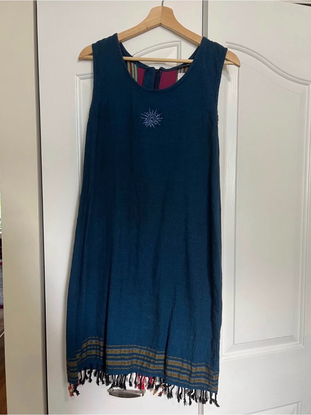 Vintage blue dress with sun motif